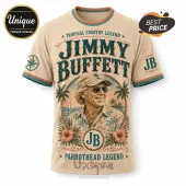 Jimmy Buffett graphic t-shirt in beige with tropical floral patterns, nautical rope, palm trees, and signature JB logos.!