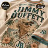 Beige crewneck shirt with vintage Jimmy Buffett portrait, palm trees, hibiscus flowers, and JB branding in teal and tan.!