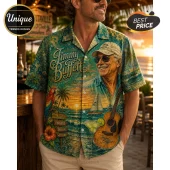 Jimmy Buffett graphic button-up shirt in teal with tropical sunset, palm trees, parrot, sailboat, and acoustic guitar print.!