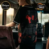 Black baseball jersey with Solaris Tour print, red map graphics, white text, and list of North American tour dates.!
