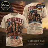 Journey band T-shirt featuring USA flag, band members, song list, and America 250 text on a vintage beige fabric background.!
