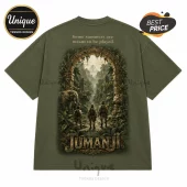 Olive green t-shirt featuring a Jumanji jungle scene print with stone archway, elephants, rhinos, and three explorers.!