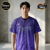 Man wearing a purple button-up baseball jersey with Rangers text, white swoosh logo, and K-pop Demon Hunters branding.!