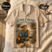Kenny Chesney button-up shirt featuring a tan beach print with seashells, palm trees, and a man playing acoustic guitar.!