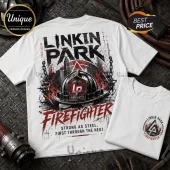 White graphic t-shirt featuring Linkin Park text, a firefighter helmet with LP logo, and cityscape design on metal floor.!