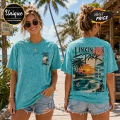 Linkin Park mineral wash teal t-shirt with tropical skate ramp graphic, sunset artwork, and branded text on back and front.!