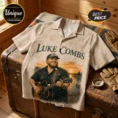 Luke Combs button-up shirt featuring a sunset lake scene, guitar, and beige fabric with seashell pattern print.!
