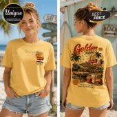 Yellow cotton t-shirt with McDonald's vintage beach graphic featuring a retro restaurant, palm trees, and car.!
