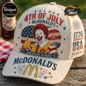 Off-white baseball cap featuring Ronald McDonald, American flag graphics, and text reading 4th of July McDonald's 1776.!