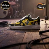 Megadeth themed sneakers with Vic Rattlehead graphic, nuclear symbol, band members, and yellow-black colorway on stage.!