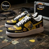 Megadeth themed custom sneakers in black and yellow with Vic Rattlehead skull graphic, nuclear symbols, and white laces.!