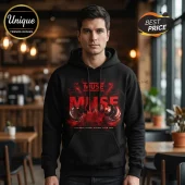 Man wearing black hooded sweatshirt with red Muse graphic print including text The Wow! Signal Europa Tour 2055.!