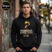 Man wearing a black hoodie with a gold NBA championship trophy graphic, text reads 2025-26 NBA CHAMPIONS Knicks NEW YORK.!