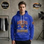 Man wearing a blue New York Knicks NBA Champions 2025-26 hoodie with white drawstrings and screen-printed graphic logo.!