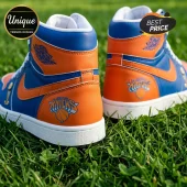 New York Knicks custom leather high-top sneakers in orange and blue with Air Jordan logos placed on green grass.!