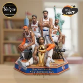New York Knicks 2026 NBA championship figurine with five players and gold trophy on a hexagonal orange and blue base.!