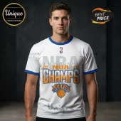 White short-sleeve crewneck t-shirt with blue trim featuring New York Knicks 2026 NBA Champions graphics on a male model.!