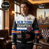 Man wearing a black, white, and blue New York Knicks championship-style varsity jacket with leather sleeves.!