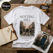 White cotton t-shirt with Notting Hill graphic of a couple on a London street and text A love story found on an ordinary street.!
