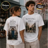 White cotton t-shirts featuring Notting Hill vintage graphic prints with a blue door, street scene, and romantic text quotes.!