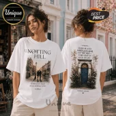 White oversized t-shirt featuring Notting Hill street scene on front and blue door floral graphic on back with quotes.!