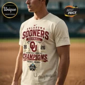 Cream-colored Oklahoma Sooners baseball shirt featuring 2026 National Champions text, crimson logo, and Omaha Bound graphic.!