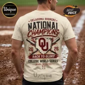 Back of cream t-shirt featuring Oklahoma Sooners 2026 National Champions text, OU logo, and crossed baseball bats graphic.!