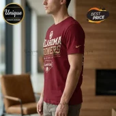 Man wearing crimson Oklahoma Sooners baseball National Champions t-shirt with gold and white screen-printed graphics.!
