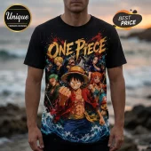 Black One Piece anime t-shirt featuring Luffy, Zoro, Nami, Sanji, and Chopper with ocean wave graphics and gold text.!