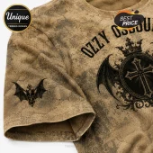 Tan cotton t-shirt with crackle texture print, Ozzy Osbourne text, bat-wing cross emblem, and small skull bat logo on sleeve.!