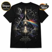 Black cotton t-shirt featuring a cosmic prism graphic, Roman numeral clock, floating planets, and audio waveform imagery.!