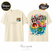 Beige cotton t-shirt featuring front pocket graphic and large back print of M&Ms characters relaxing in pool floats.!