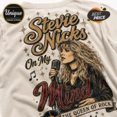 Cream-colored t-shirt with Stevie Nicks illustration, vintage microphone, star icons, and text reading The Queen of Rock.!