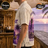 Man wearing a cream button-down shirt with purple vintage microphone and guitar sunset ocean print, short sleeves.!