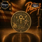 Gold coin commemorative piece featuring Prince icon, guitar, music notes, text The Purple One, America 250, and 1776-2026.!