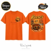 Bright orange t-shirt with Reese's logo, palm trees, sunglasses, and beach text on the back and small front logo print.!