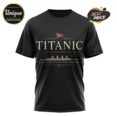 Black short-sleeve t-shirt featuring a gold Titanic ocean liner graphic with text and a red flag on a white background.!