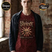 Man wearing a red Slipknot band t-shirt with a cracked sun, barbed wire, and Heatwave, Static & Mayhem text.!