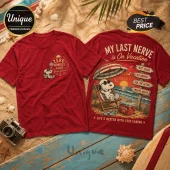 Maroon cotton t-shirt featuring Snoopy relaxing on the beach with sunset art and text reading My Last Nerve is On Vacation.!