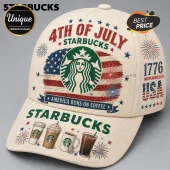 Cream colored baseball cap with red, white, and blue 4th of July Starbucks graphics, fireworks, and coffee drink prints.!