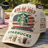 Off-white baseball cap with 4th of July Starbucks logo, American flag graphics, fireworks, and coffee drink illustrations.!