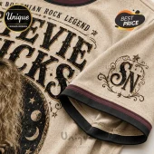 Beige graphic t-shirt with Stevie Nicks text, crescent moon imagery, and an SN monogram on the sleeve with burgundy trim.!