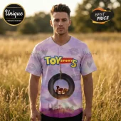 Toy Story 5 button-down baseball jersey in light purple with tire graphic, character silhouettes, hearts, and lip prints.!