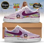 Custom lavender sneakers with Toy Story 5 logos, Taylor Swift typography, signature prints, and dark purple swooshes.!