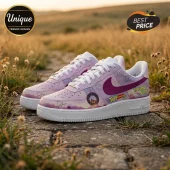 Custom lavender sneakers with Taylor Swift and Toy Story 5 graphics, white laces, and purple swooshes on stone ground.!