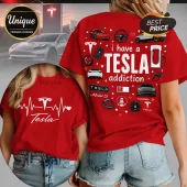 Red cotton t-shirt featuring I have a Tesla addiction text with icons of Tesla cars, a steering wheel, and charging cables.!