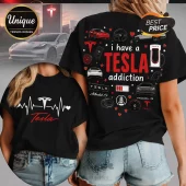 Black t-shirt featuring Tesla car graphics, charging stations, logos, and the text I have a Tesla addiction.!