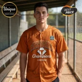 Man wearing burnt orange Texas Longhorns NCAA National Champions softball jersey at a baseball field dugout.!