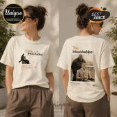Off-white cotton t-shirt featuring The Intouchables movie graphic print on front and back with film quote and credits.!