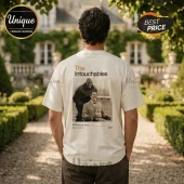 Cream colored cotton t-shirt with The Intouchables movie poster graphic on back featuring two men laughing outdoors.!